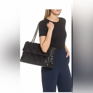 Kurt Geiger Black Quilted Shoulder Bag
Size XXL